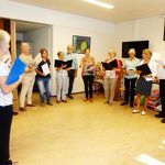 Zangkoor repetitie in de Van der Leeuwstraat 2016